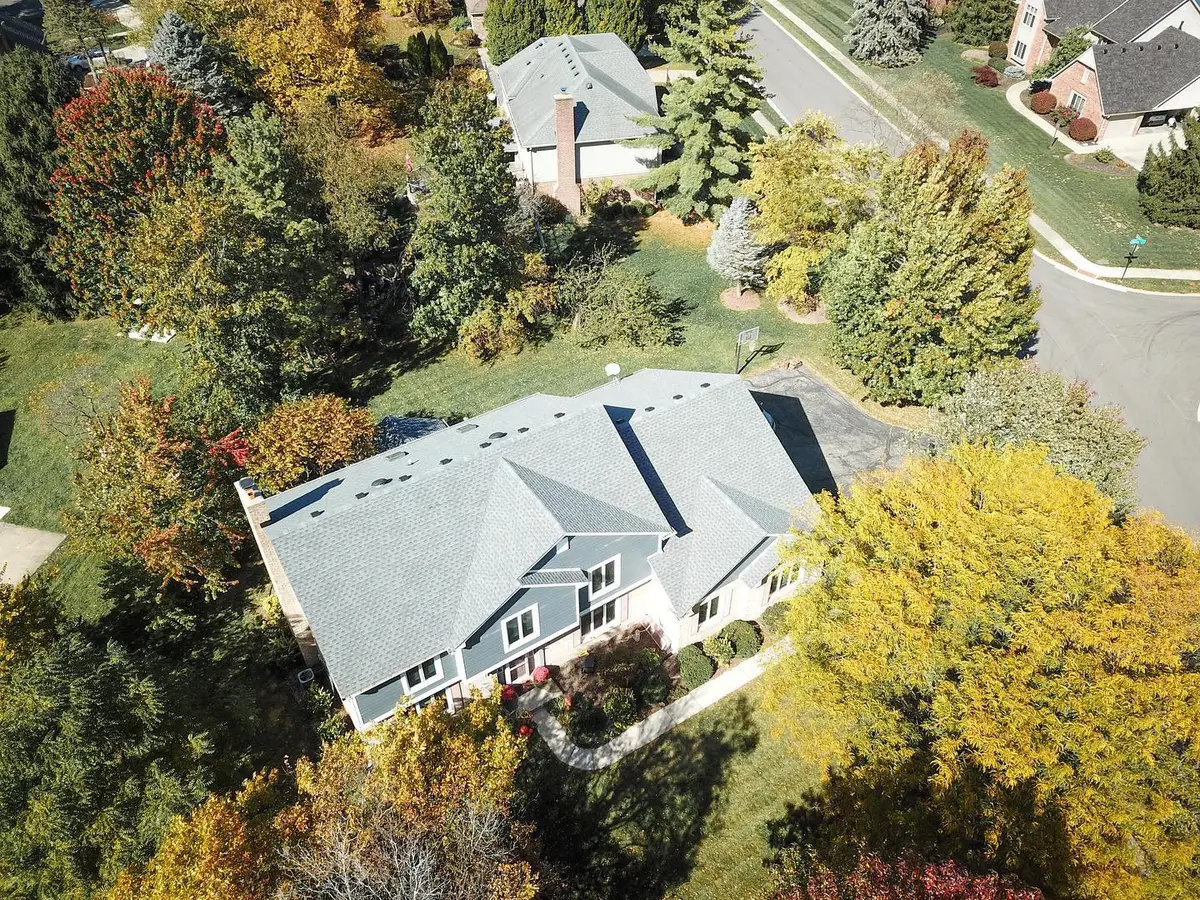 downward arial view of beautiful roof and siding installed by Open Box Roofing