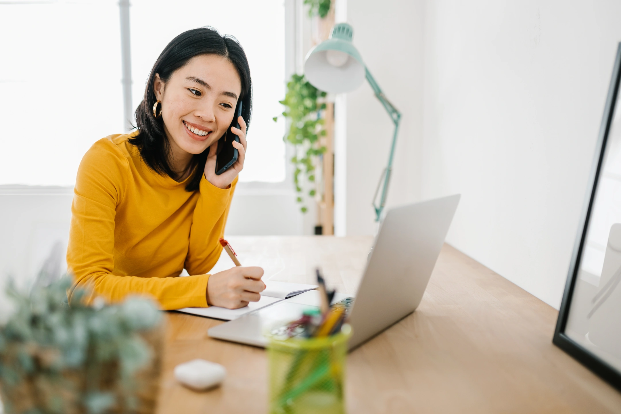 woman on phone with contractor scheduling appointment