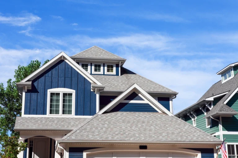 House with blue siding and long-lasting shingle roof