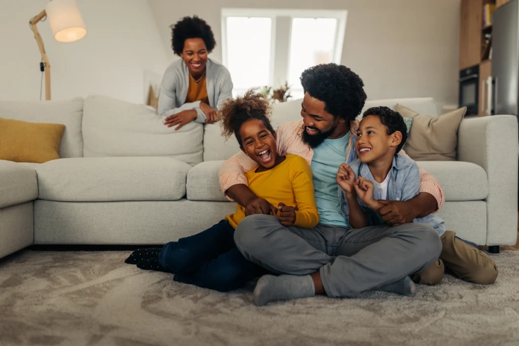 family laughing together at home