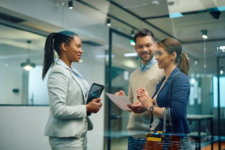young homeowners talking to the consultant about financial investment 
