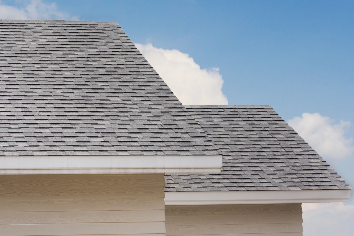close up image of asphalt architectural shingles on roof