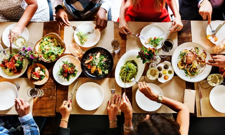 top view of friends eating food together