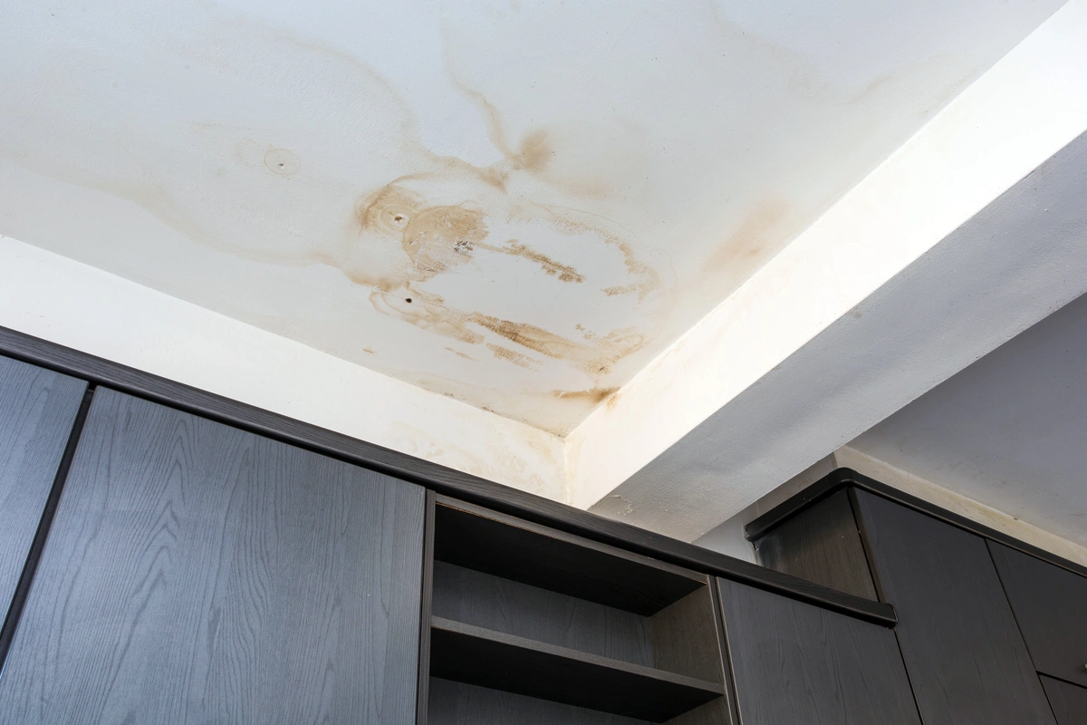 ceiling with water stains from roof