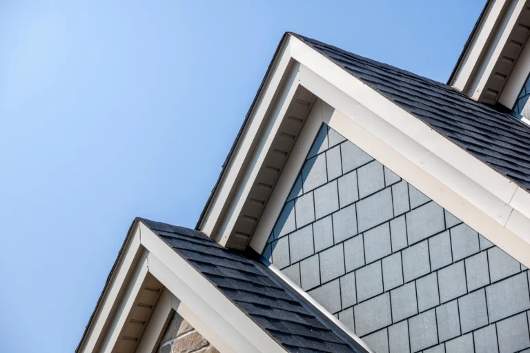 Roof fascia on a gray house