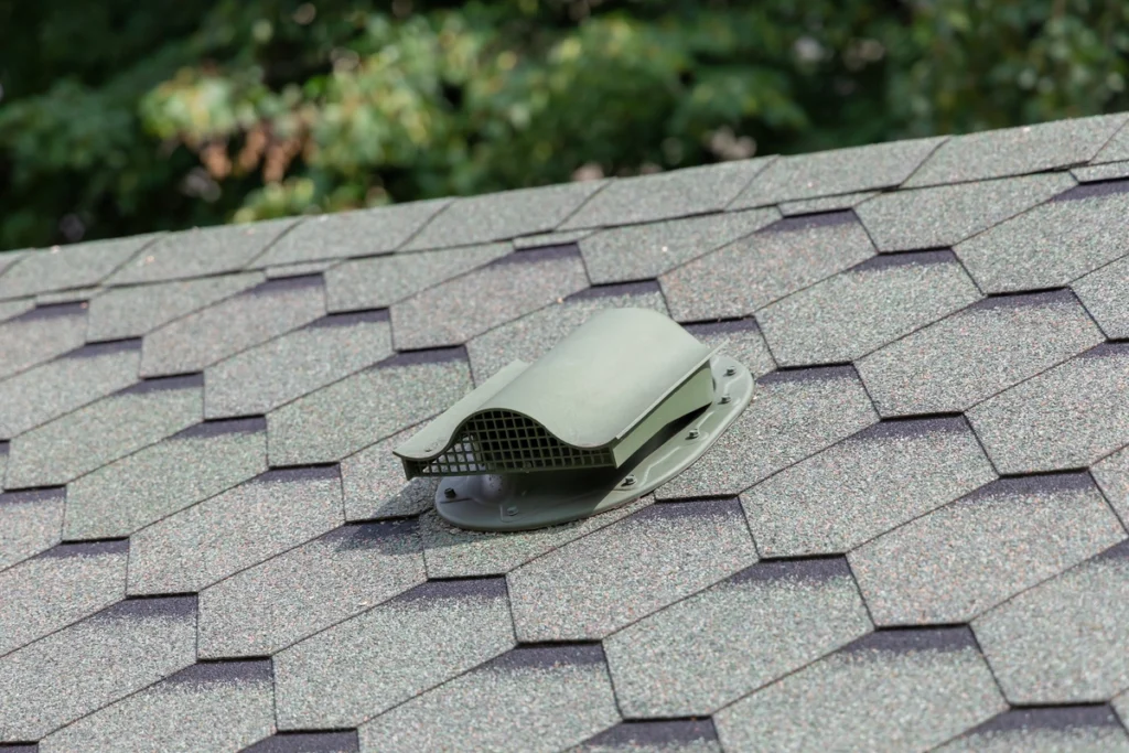 a roof vent on dimensional shingles