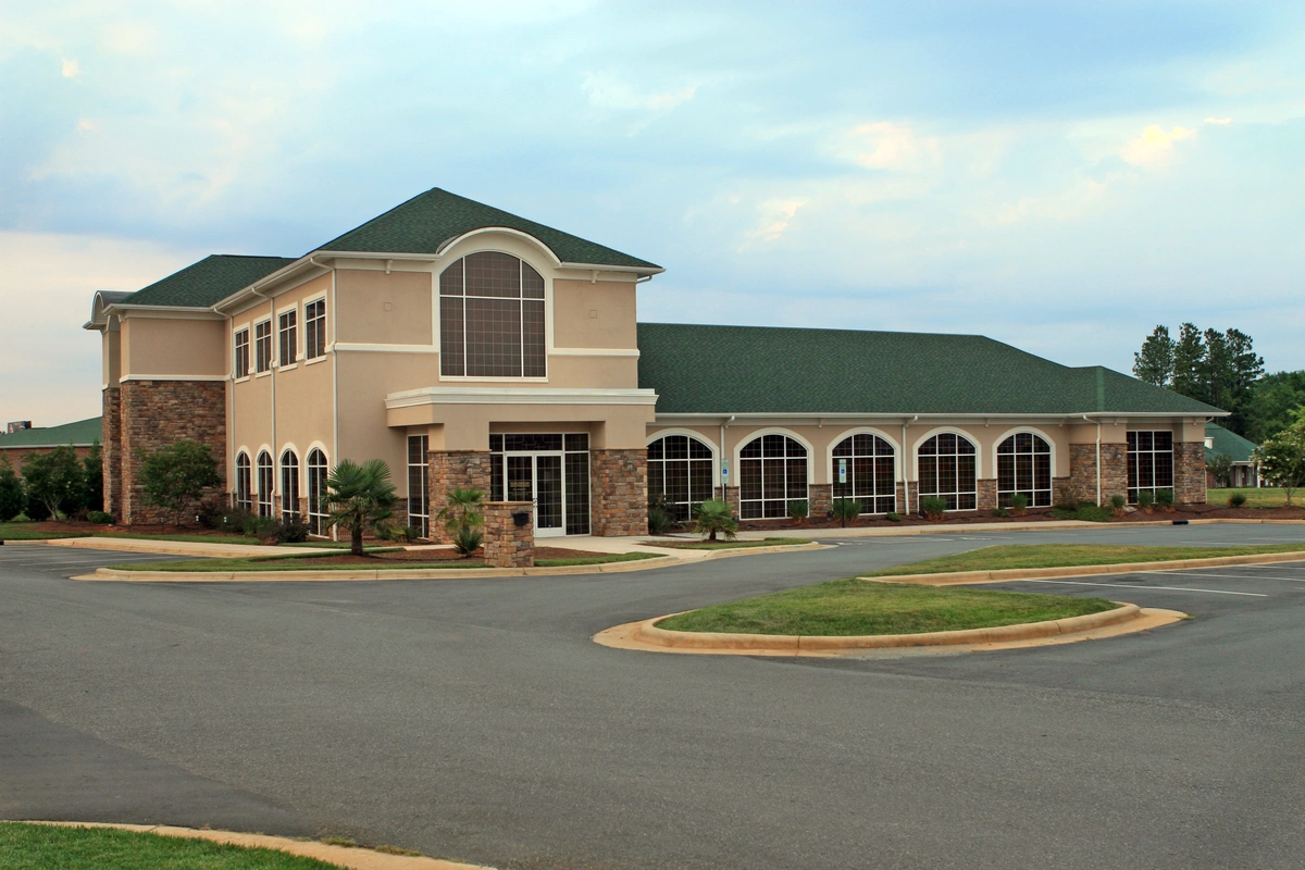 commercial building with parking lot 1