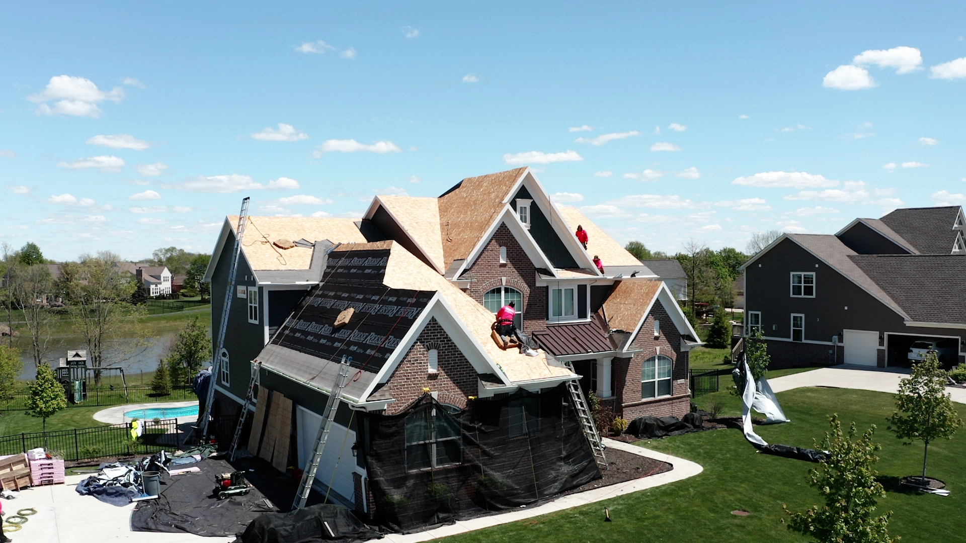 contractors working on roof